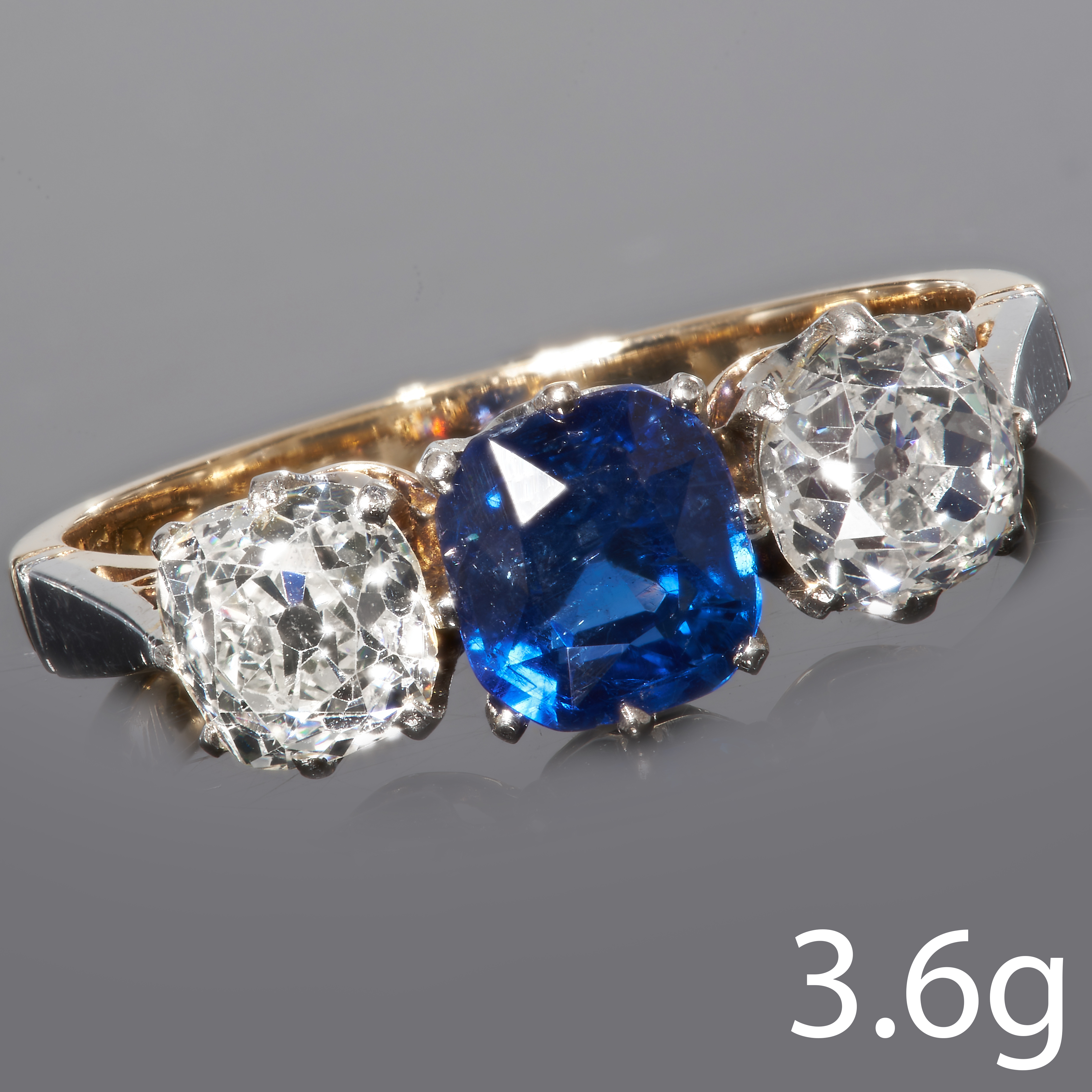 SAPPHIRE AND DIAMOND 3-STONE RING