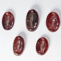 LOT OF CARVED INTAGLIOS, depicting warriors 6.6 grams.