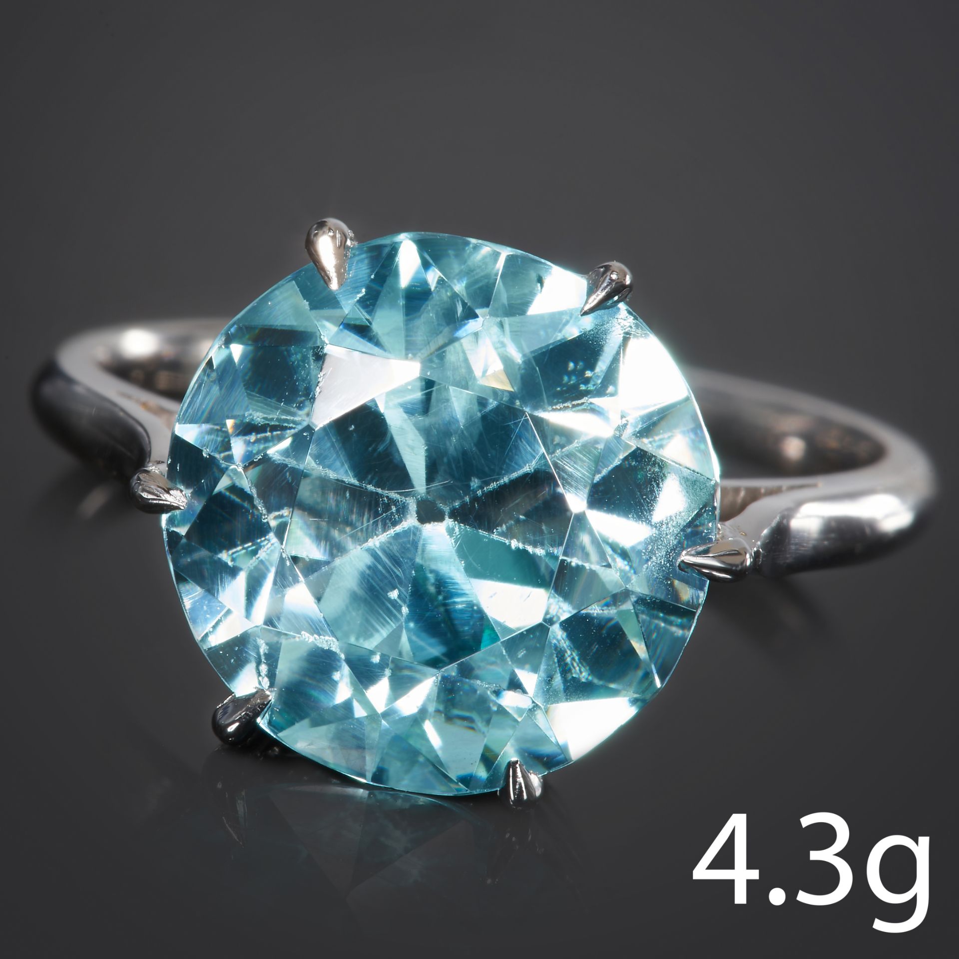 LARGE BLUE ZIRCON SOLITAIRE RING