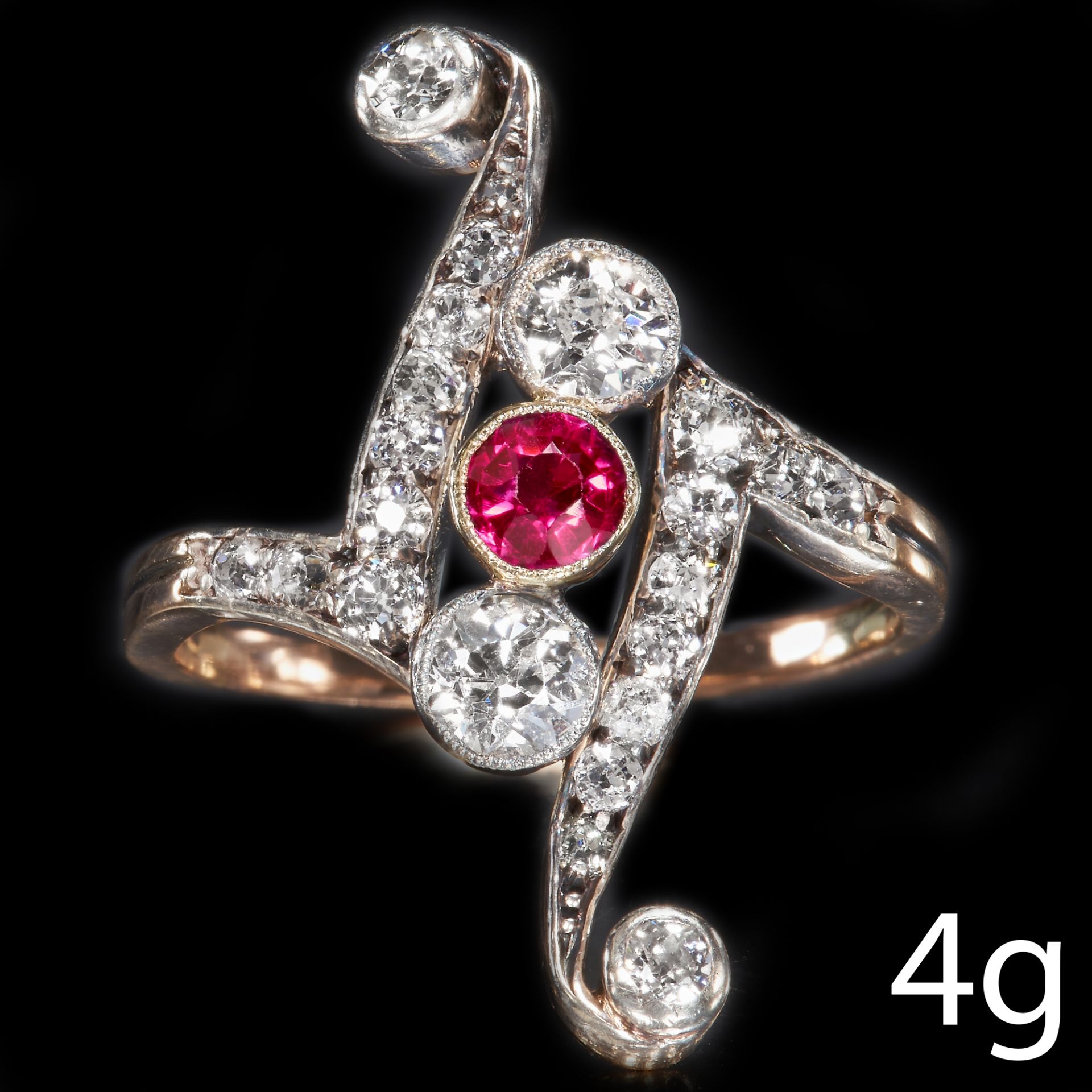 EDWARDIAN RUBY AND OLD CUT DIAMOND UP FINGER RING