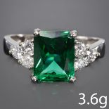DIAMOND AND GREEN STONE RING