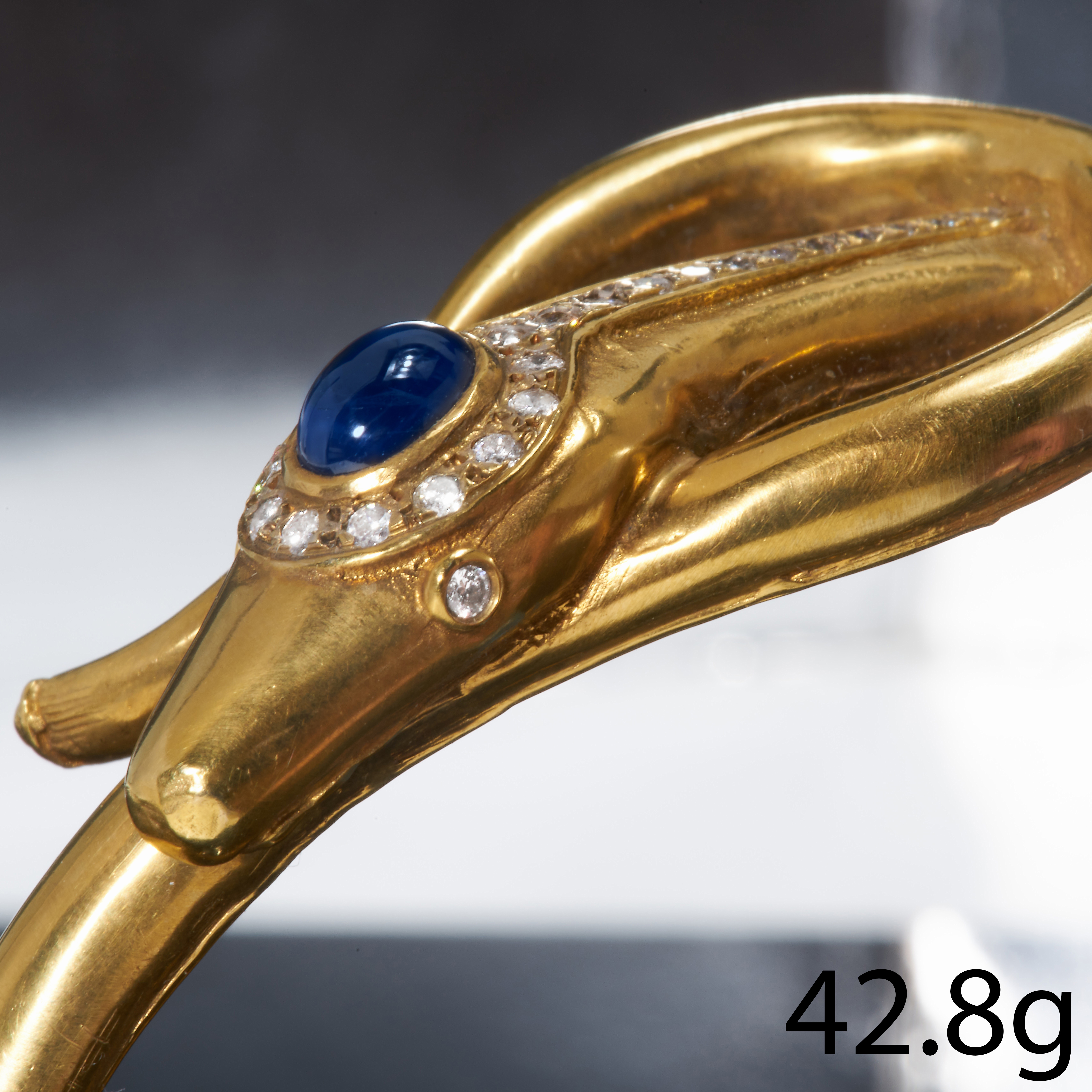 FINE SAPPHIRE AND DIAMOND GOLD SNAKE BANGLE