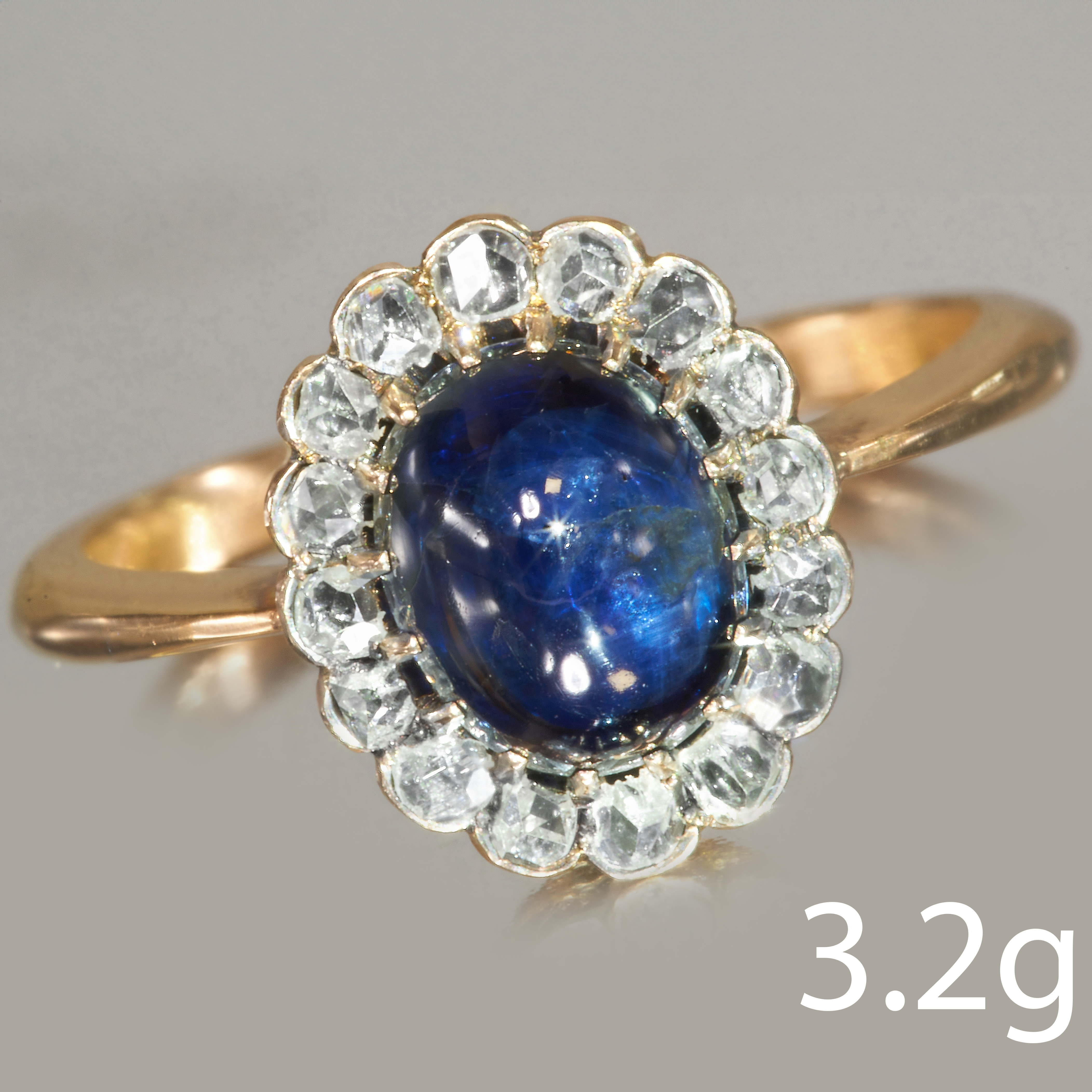 SAPPHIRE AND DIAMOND CLUSTER RING