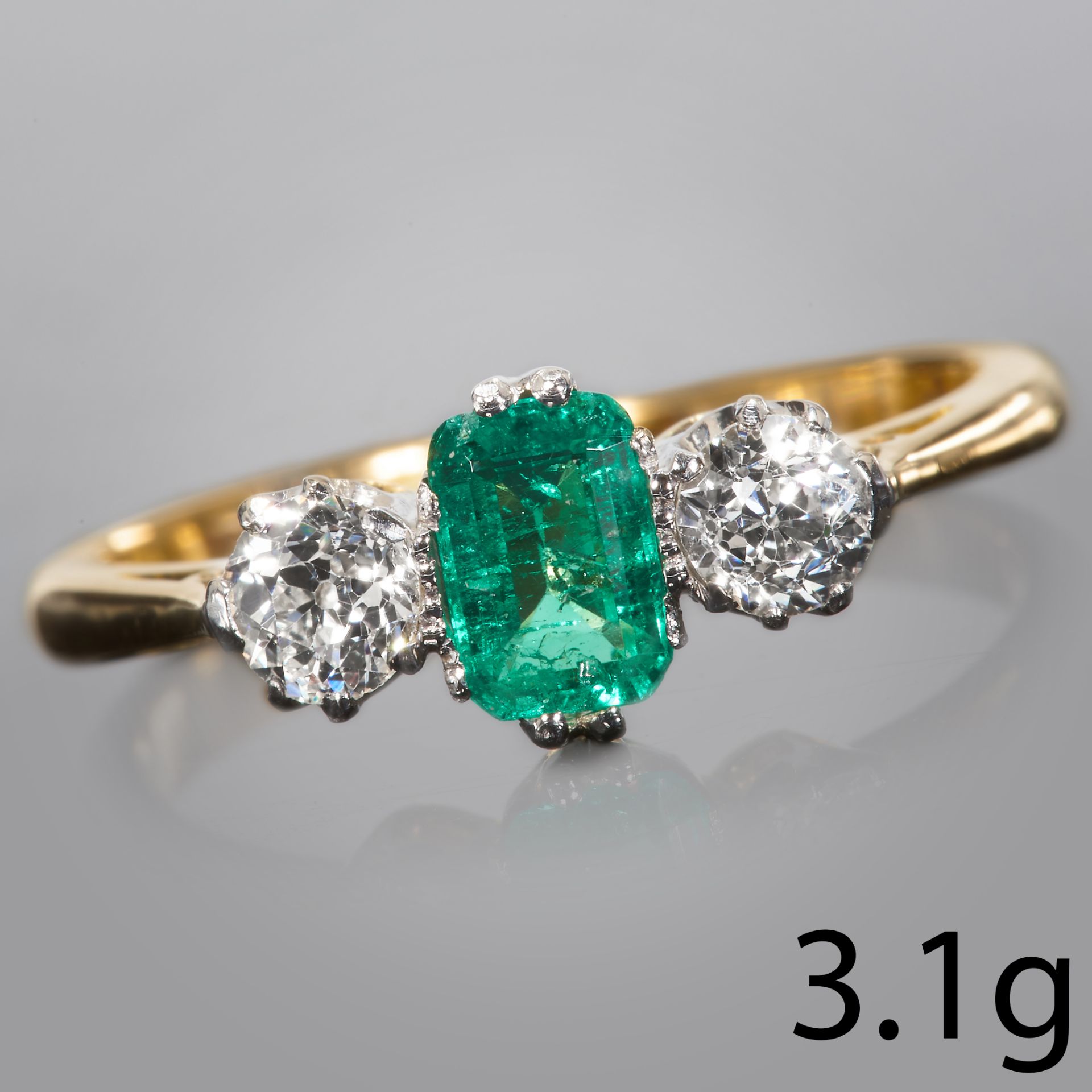 EMERALD AND DIAMOND 3-STONE RING