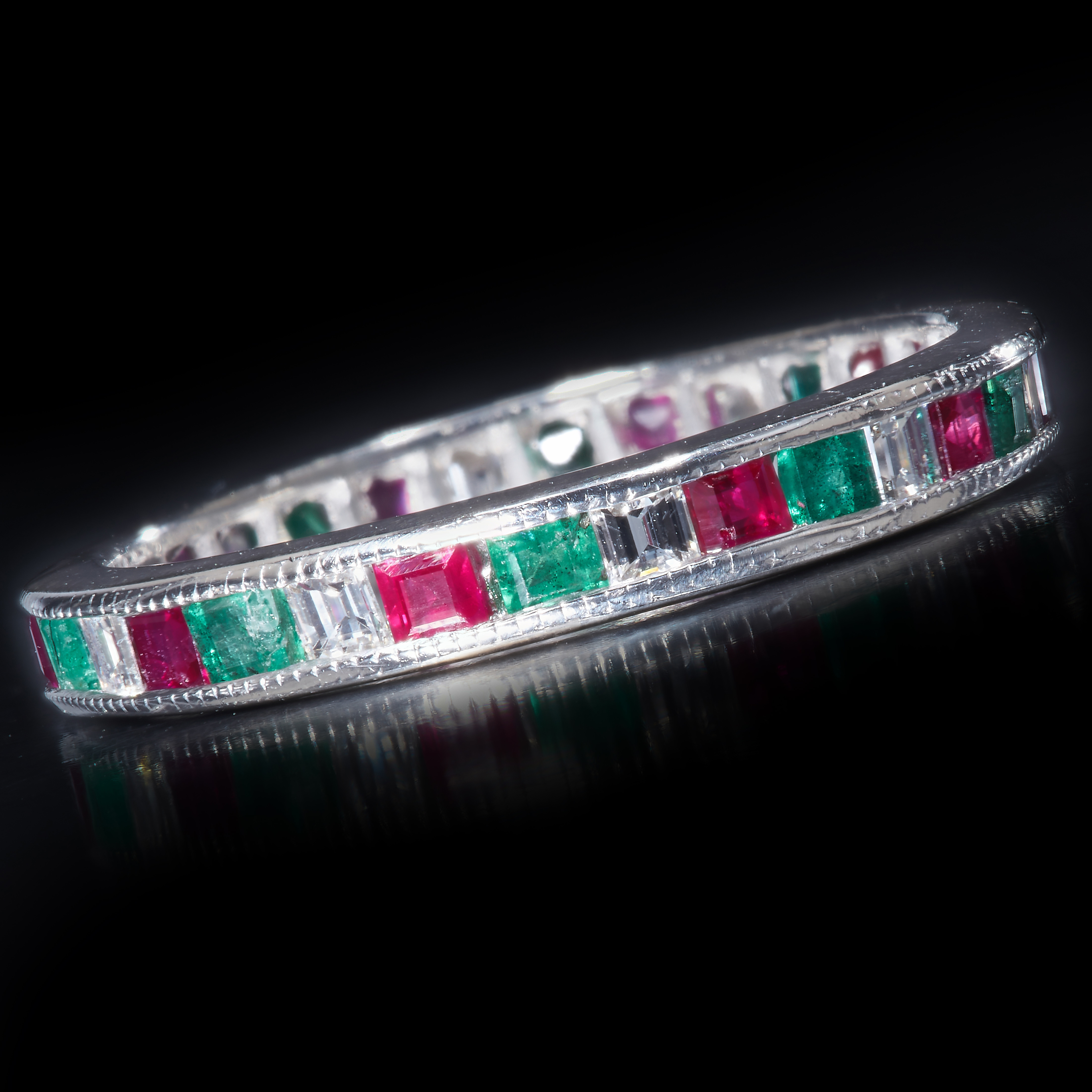 UNUSUAL DIAMOND RUBY AND EMERALD FULL ETERNITY RING