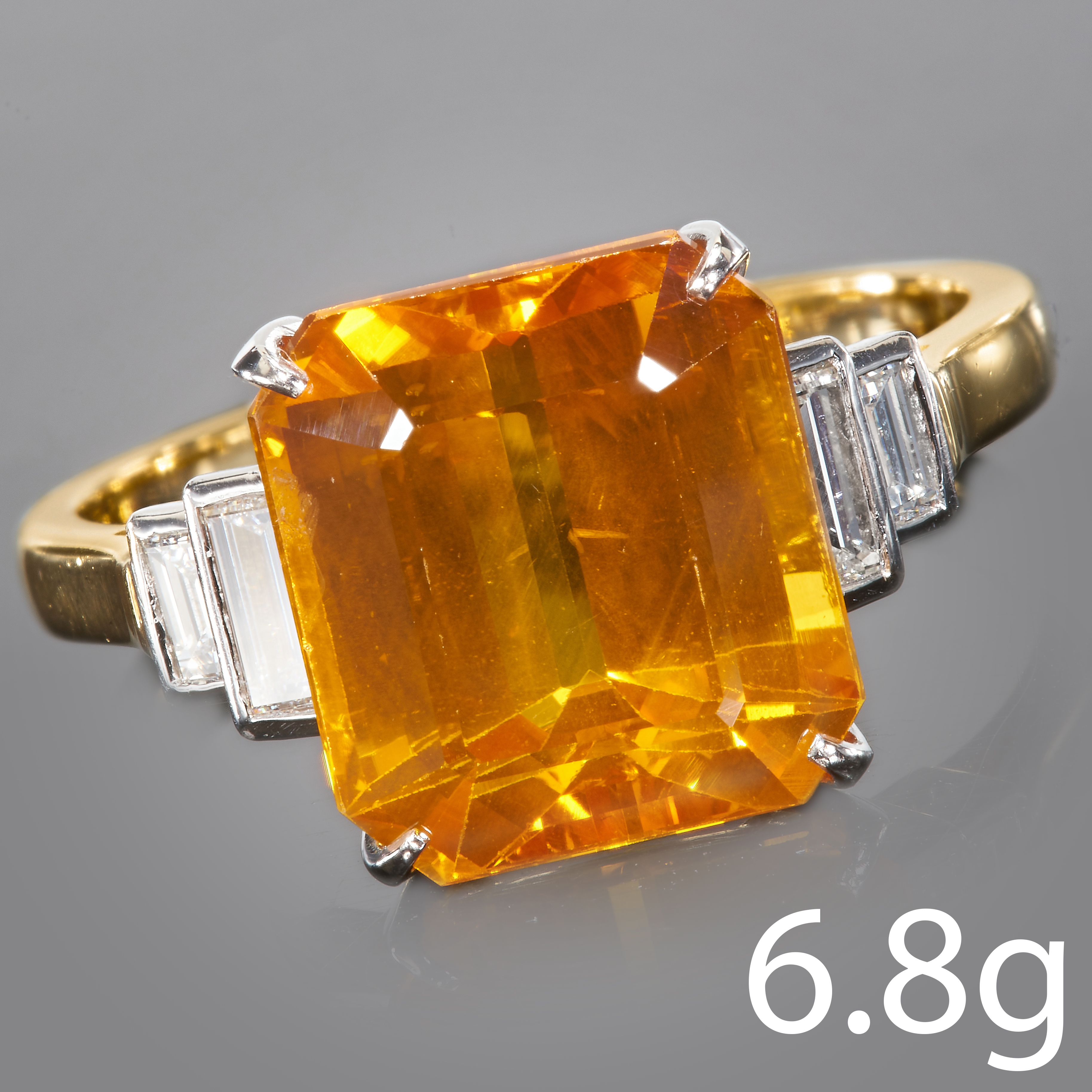 LARGE ORANGE SAPPHIRE AND DIAMOND RING