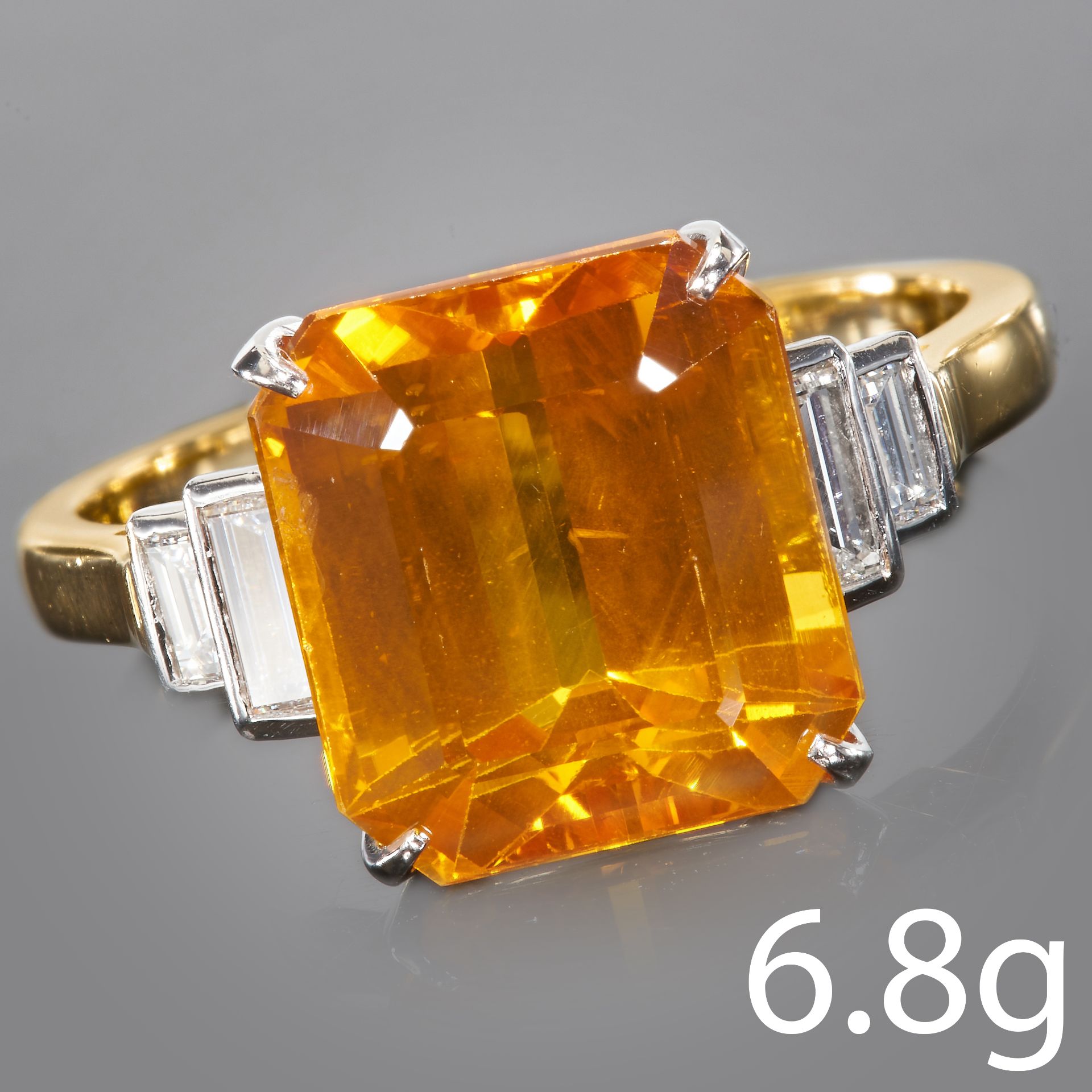 LARGE ORANGE SAPPHIRE AND DIAMOND RING