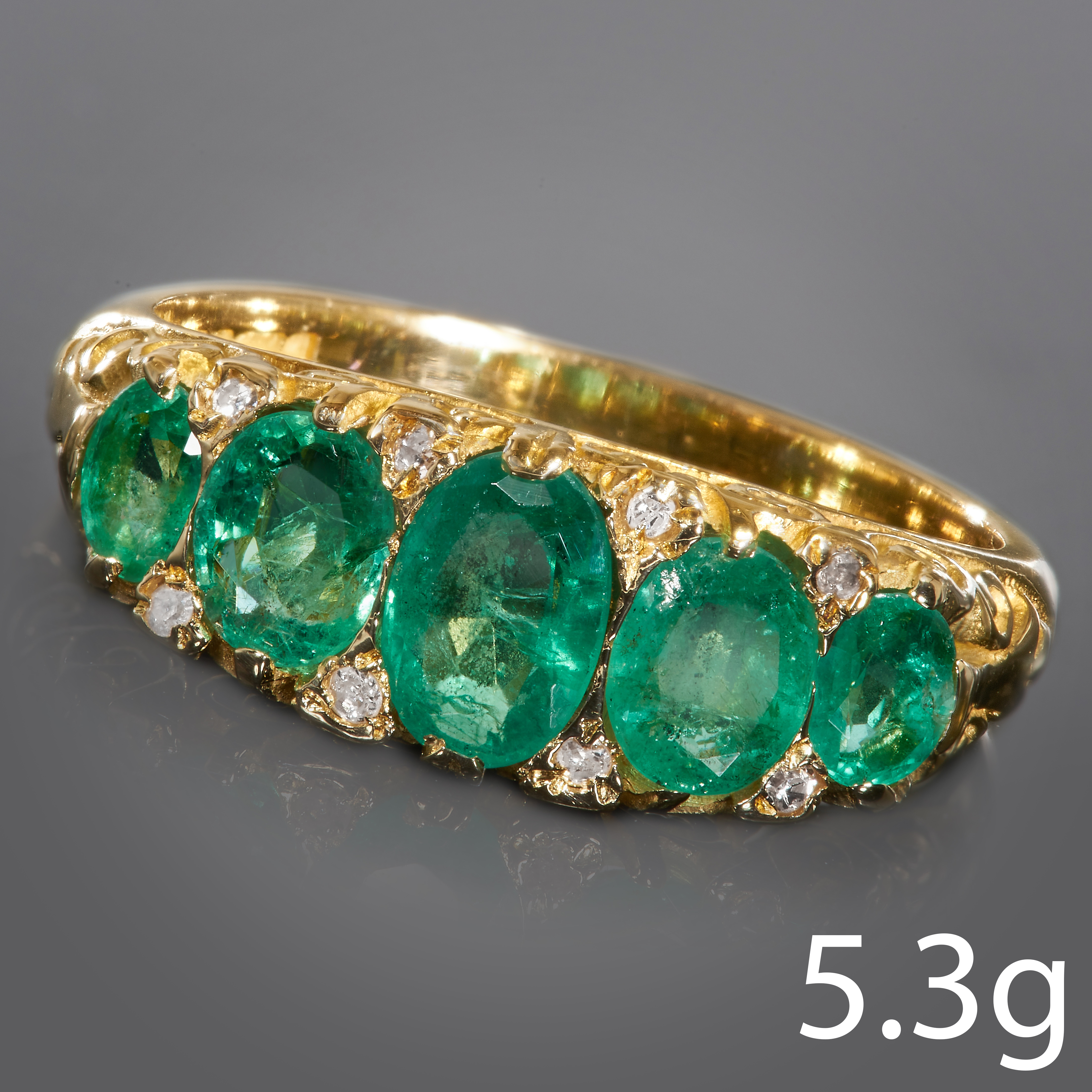 ANTIQUE EMERALD AND DIAMOND 5-STONE RING