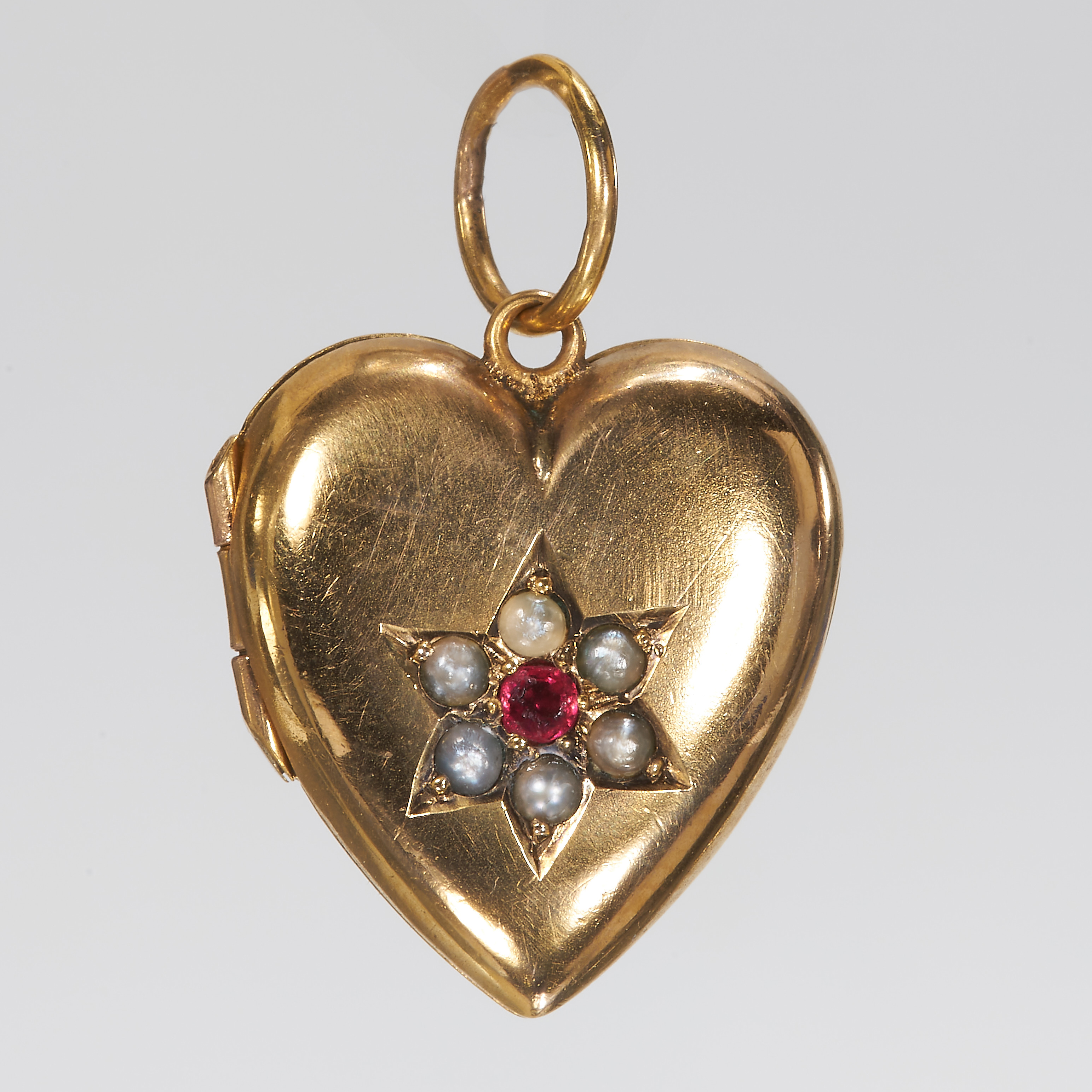 ANTIQUE RUBY AND PEARL HEART GOLD LOCKET PENDANT