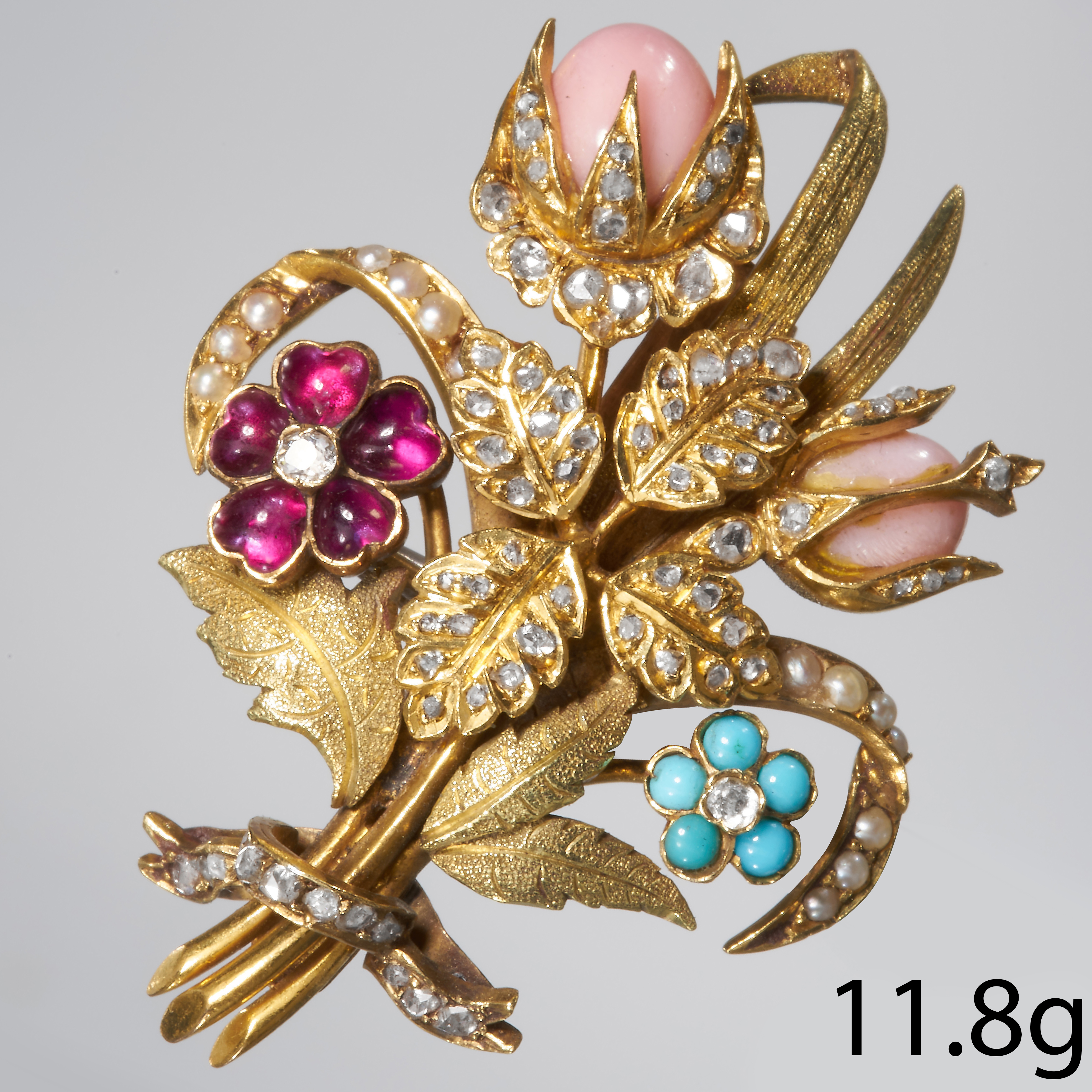CONCH PEARLS, DIAMOND, TURQUOISE, TOURMALINE AND SEED PEARL FLORAL BROOCH.