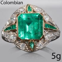 A 4.04CT COLOMBIAN EMERALD AND DIAMOND CLUSTER RING