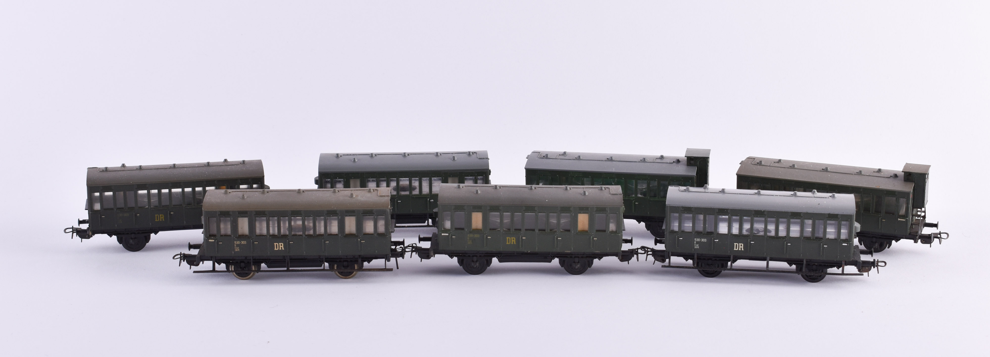 A group of passenger coaches 530-303 DR and 530-213 DR Piko