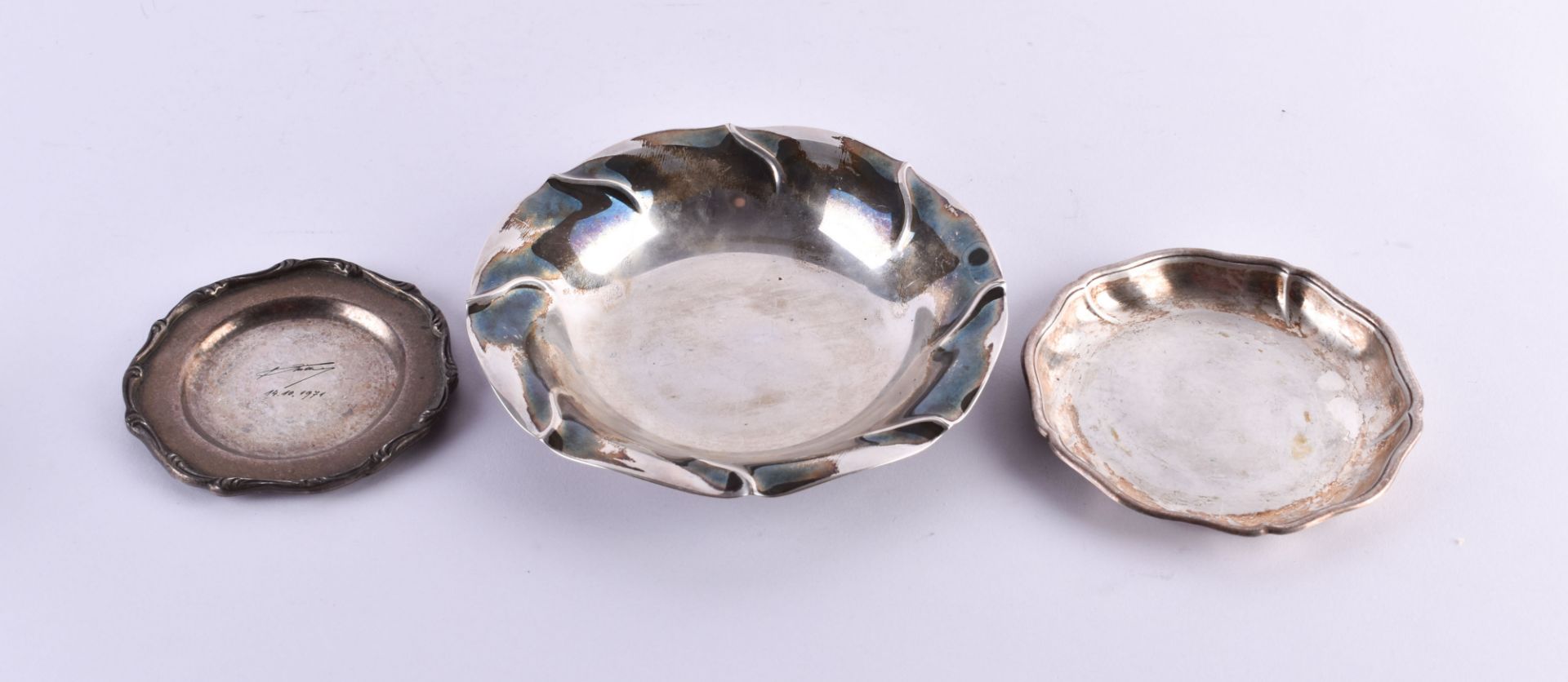 3 silver bowls