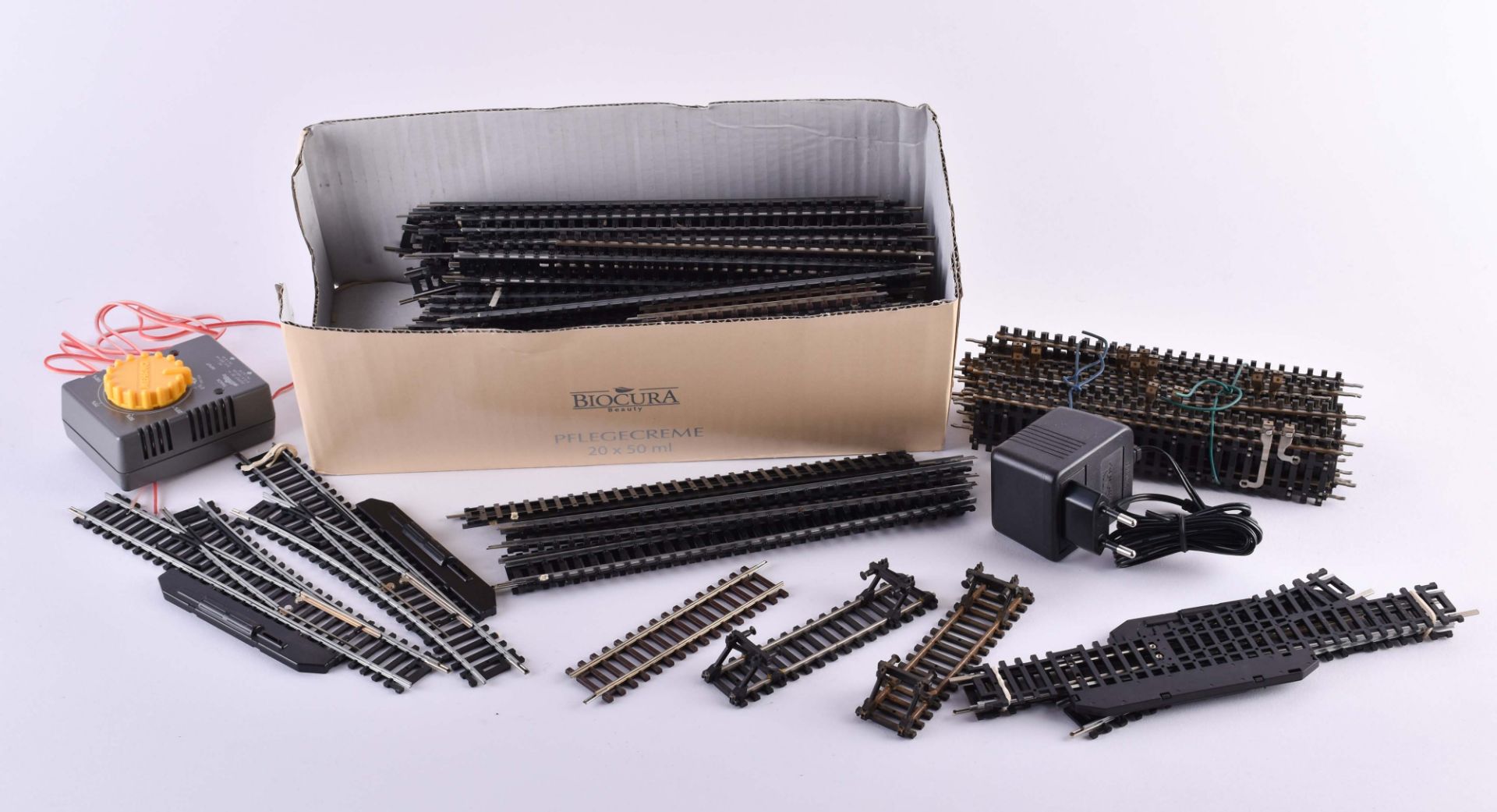 A group of model railway accessories