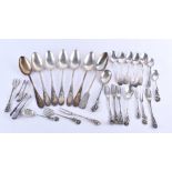 A group of silver cutlery