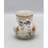 Fayence Vase mit blauer Schleife / A faience vase with a blue ribbon and flowers, Emile Gallé, ...