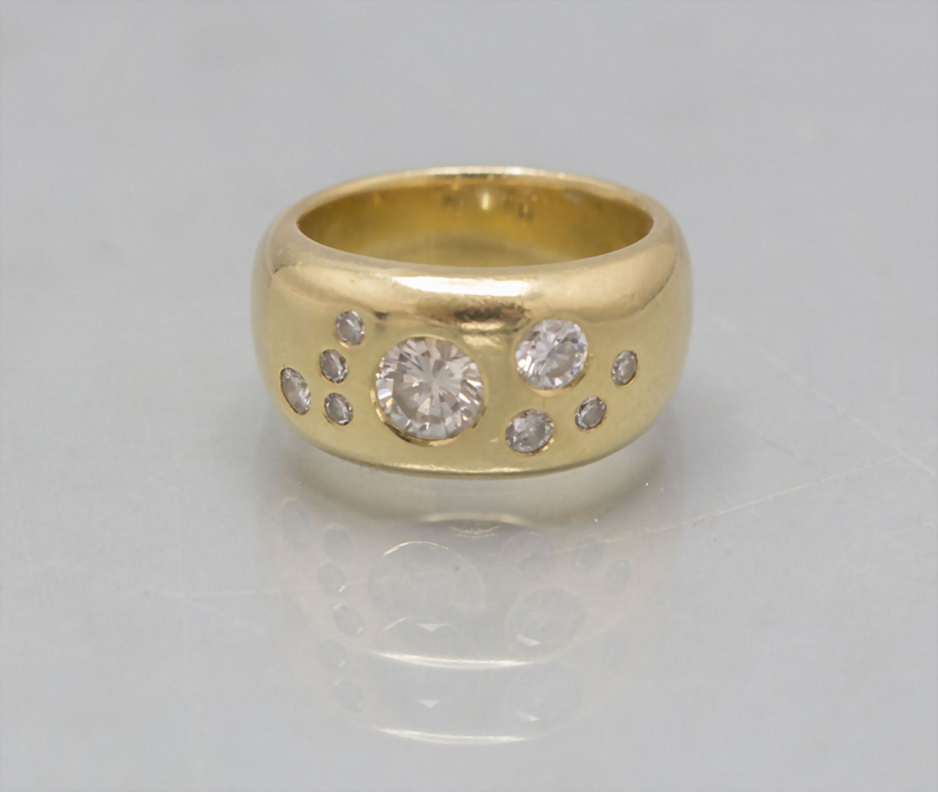 Damenring mit Diamanten / A ladies 18 ct gold ring with diamonds