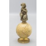 Bronze Mädchen mit Blumengirlande auf Kugel / A bronze girl with a flower garland on a ball, ...