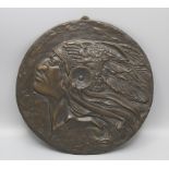Bronzeplakette mit dem Profil eines Indianers / A bronze plaque with the profile of a native ...