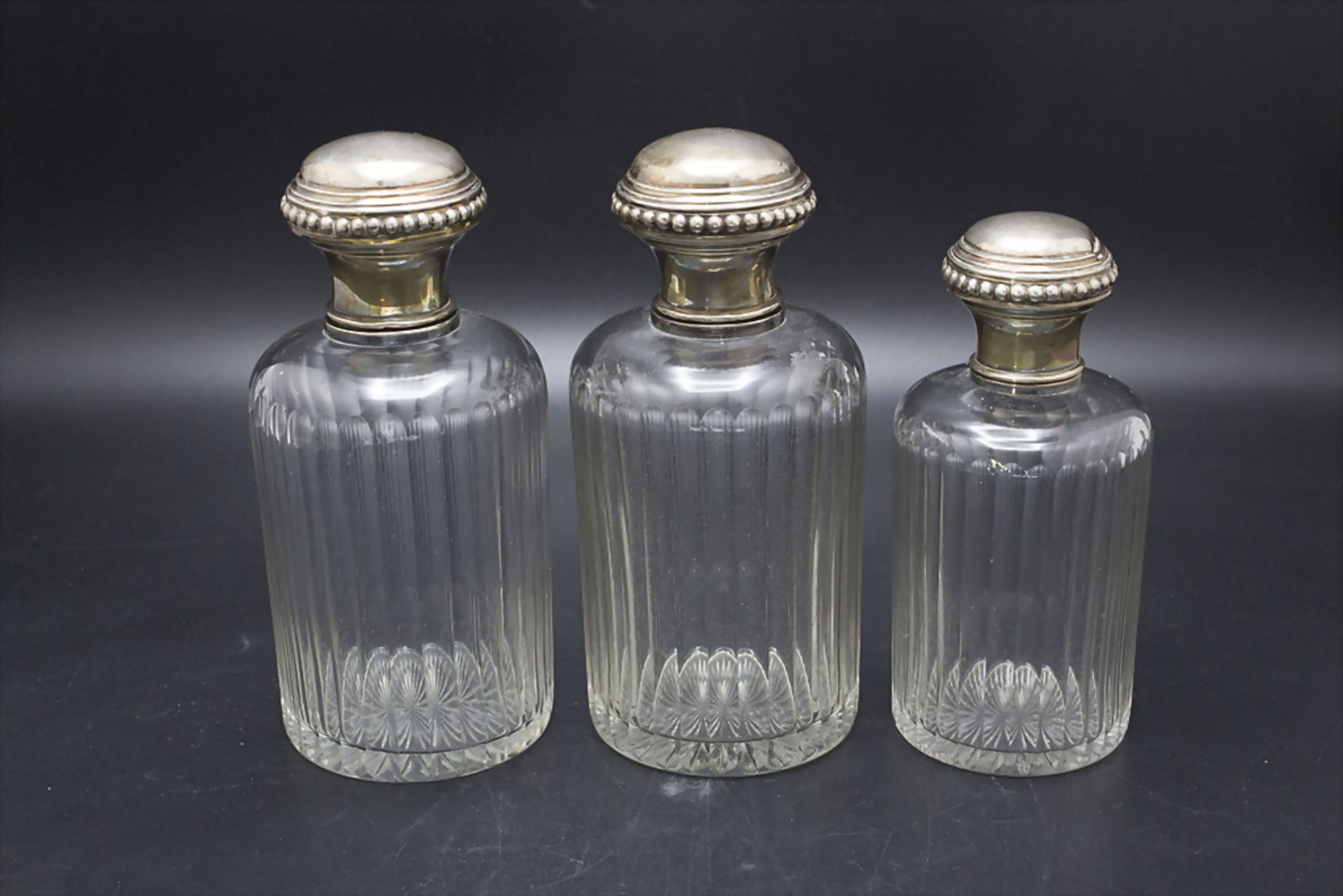 3 Likörflaschen mit Silbermontur / 3 liquer bottles with silver mounts, Gruhier (Père et ...