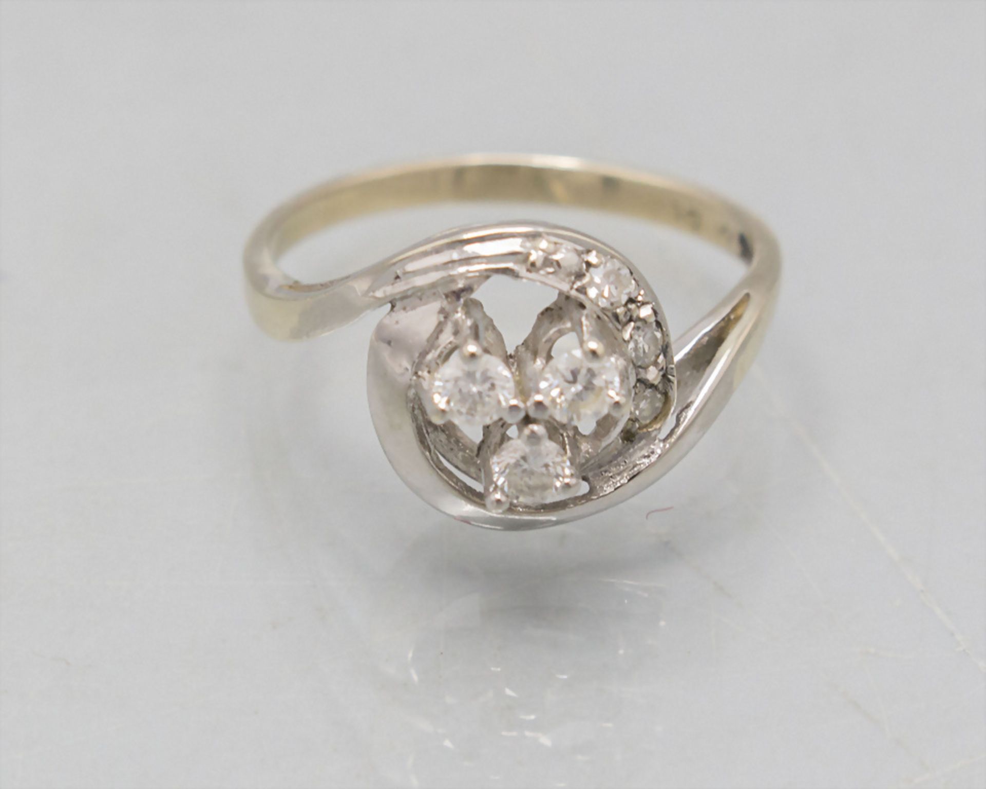 Damenring mit Diamanten / A ladies 14 ct gold ring with diamonds