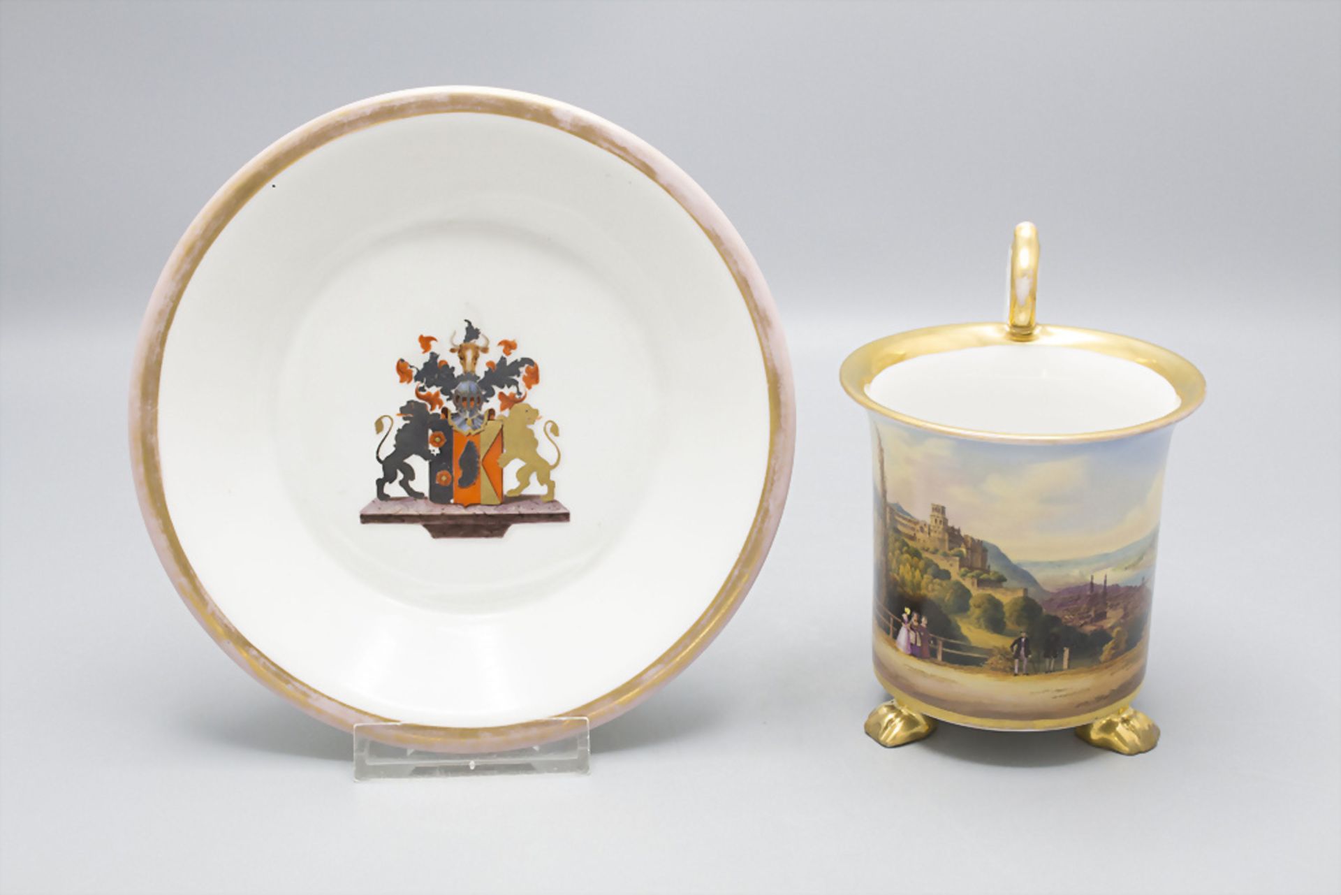 Ansichtentasse mit Untertasse 'Heidelberger Schloss' / A cup and saucer with a view on the ...