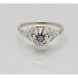 Damenring mit Diamanten und Saphir / A ladies 18 ct gold ring with diamonds and sapphire