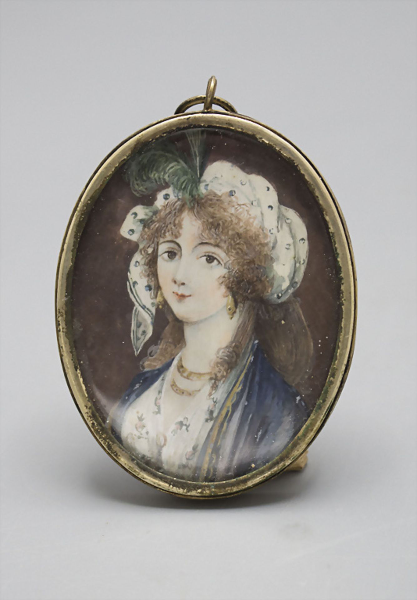 Miniatur eines jungen Mädchens mit Federn im Haar / A miniature portrait of a girl wearing a ...
