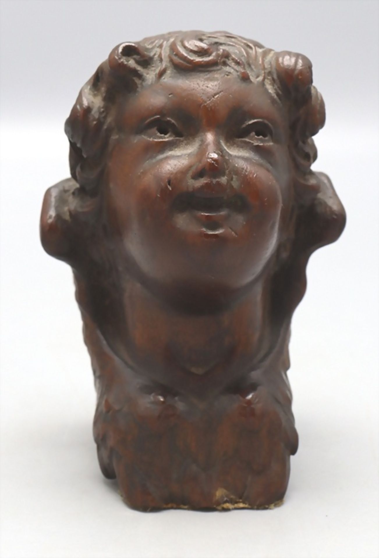 Holz Applike 'Geflügelter Engelskopf' / A wooden head of a winged cherub, 18. Jh. oder älter