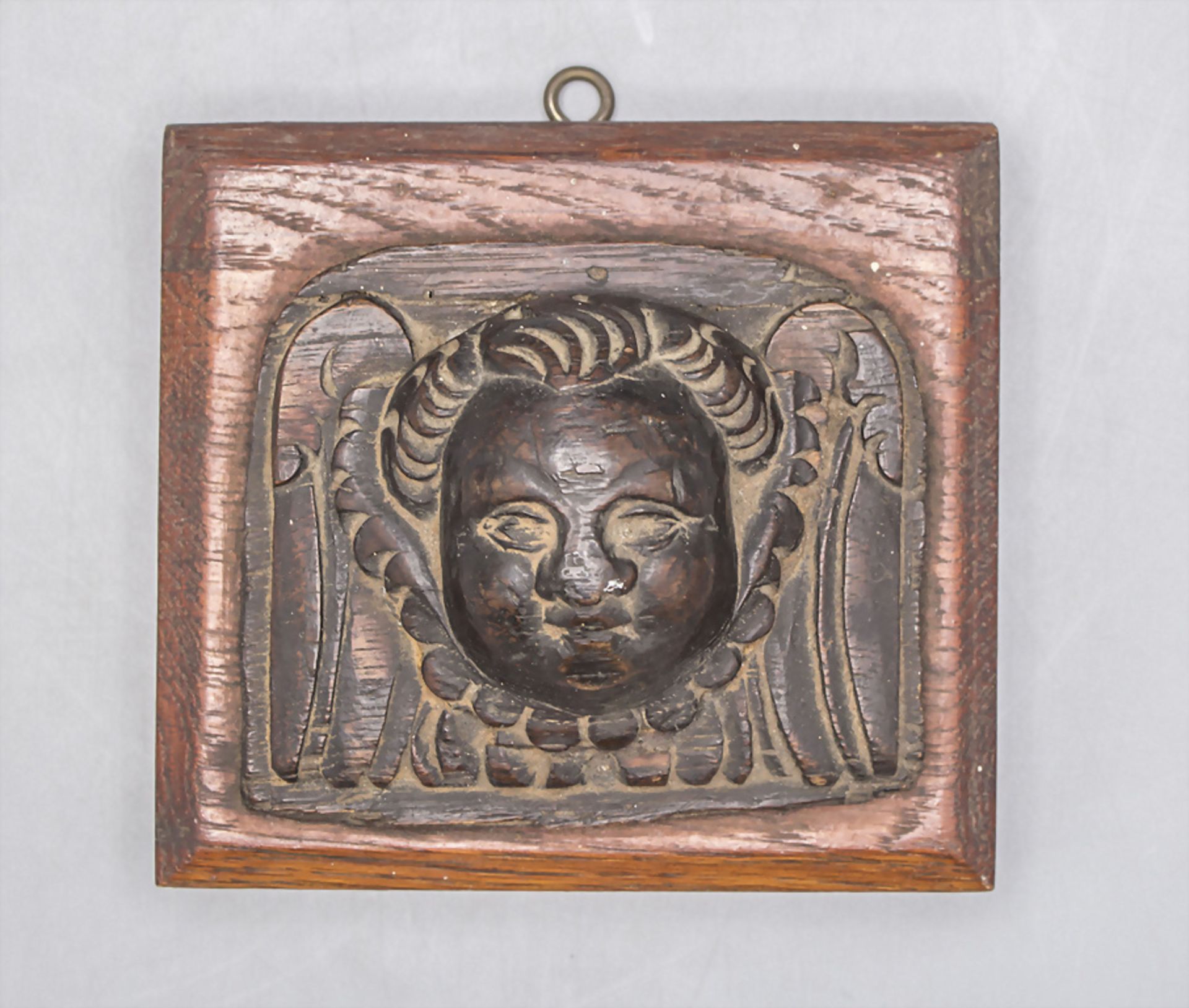 Holzapplike mit einem Engelskopf / A wooden wall hanging with the head of a cherub, 17. Jh. ...