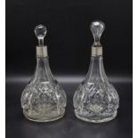 Paar Kristallkaraffen mit Silbermontur / A pair of crystal glass decanter with silver mounts, ...
