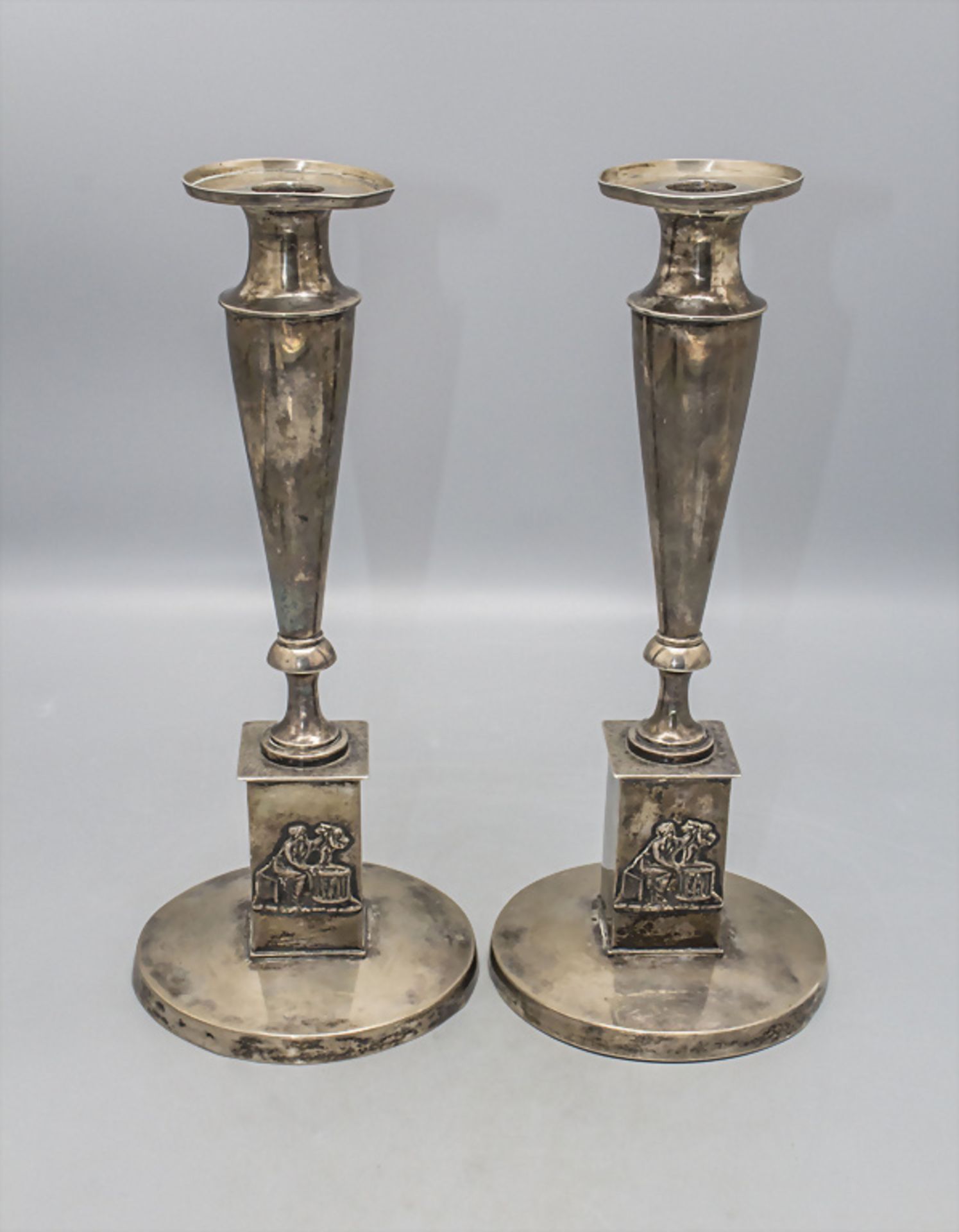 Paar Empire Kerzenleuchter / A pair of Empire silver candlesticks, Jeremias Balthasar ...