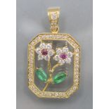 Anhänger / An 18 ct gold pendant with diamonds, emeralds and rubies