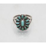 Ring mit Türkisen / A silver ring with turquoise, Anfang 20. Jh.
