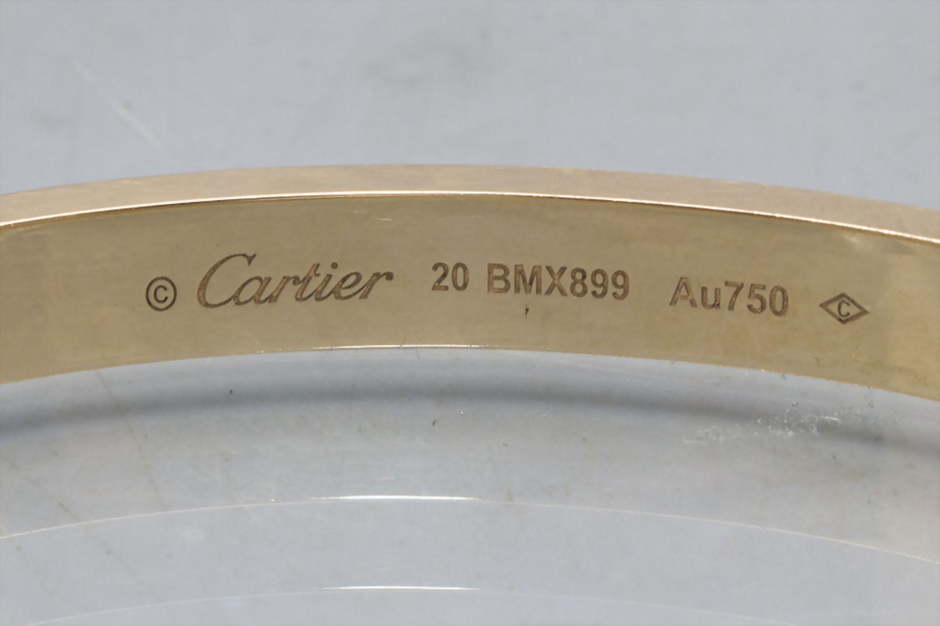 Cartier, Armband mit Diamanten 'Love Bracelet' / An 18 ct. gold bracelet with diamonds - Bild 6 aus 6