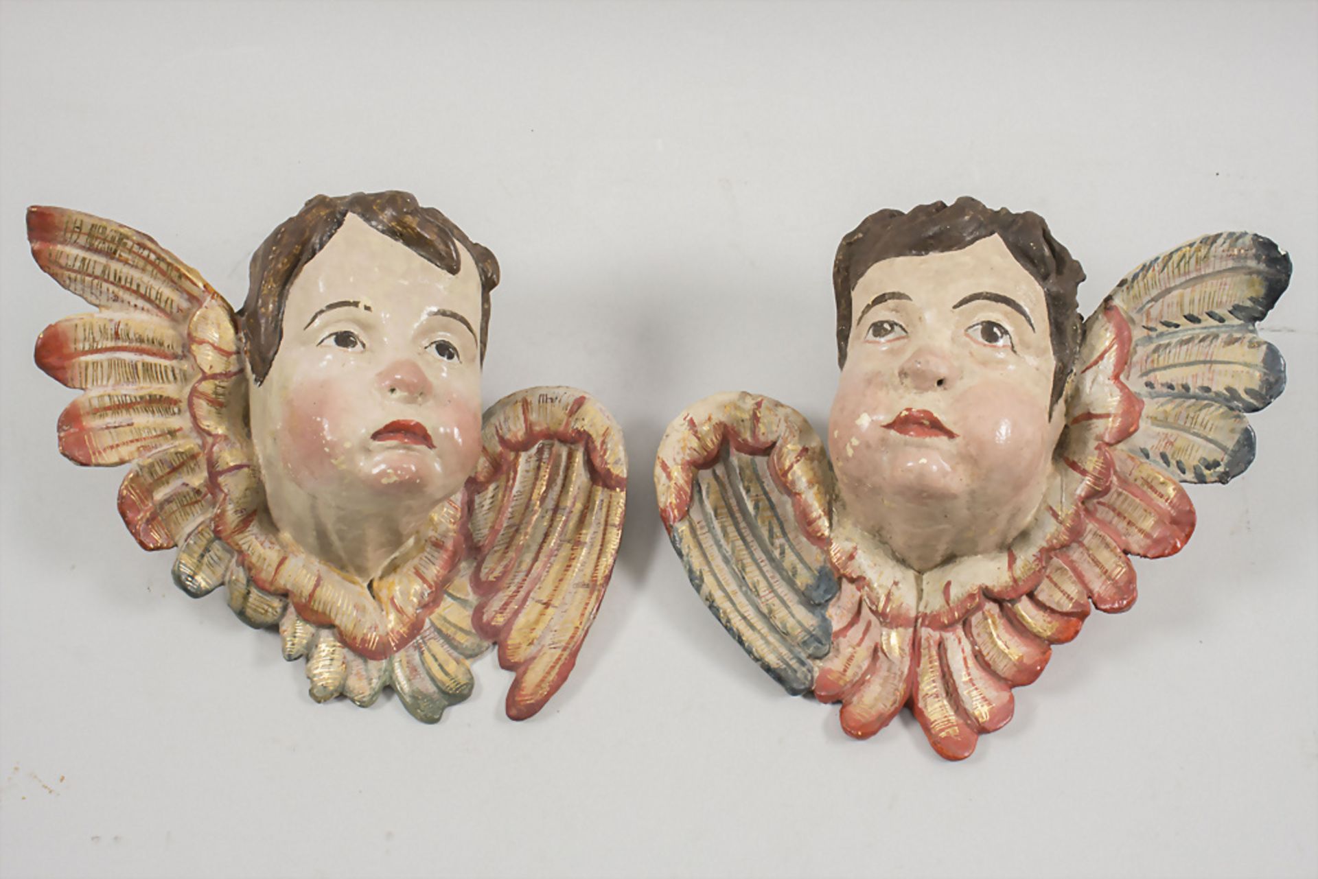 Paar geflügelte Puttoköpfe / A pair of winged putto heads, süddeutsch, 18. Jh.