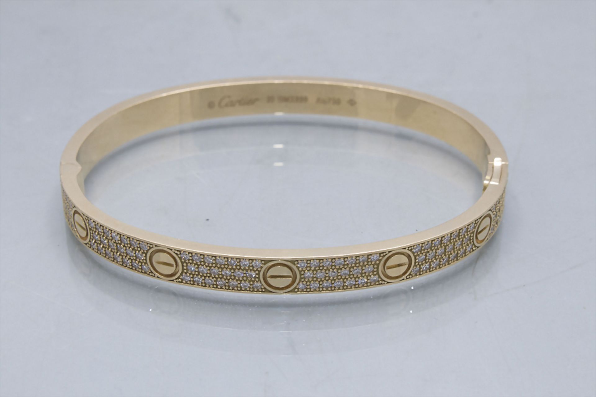 Cartier, Armband mit Diamanten 'Love Bracelet' / An 18 ct. gold bracelet with diamonds - Bild 4 aus 6