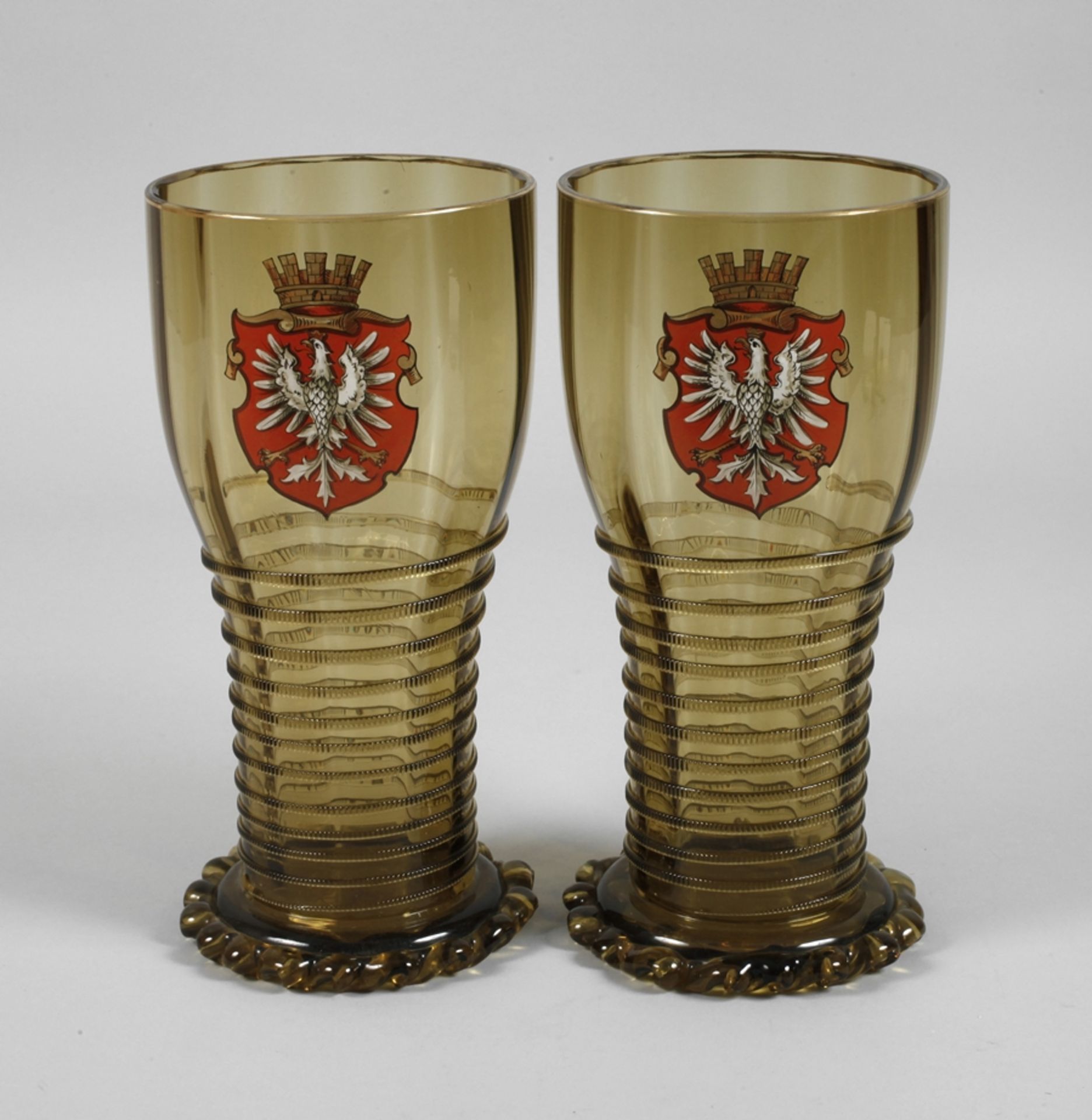 Pair of oversized coat of arms goblets