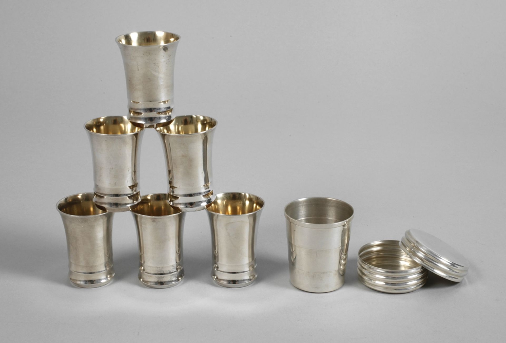 Silver convolute schnapps cup and tin