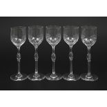 Five stemmed glasses with thistle decoration