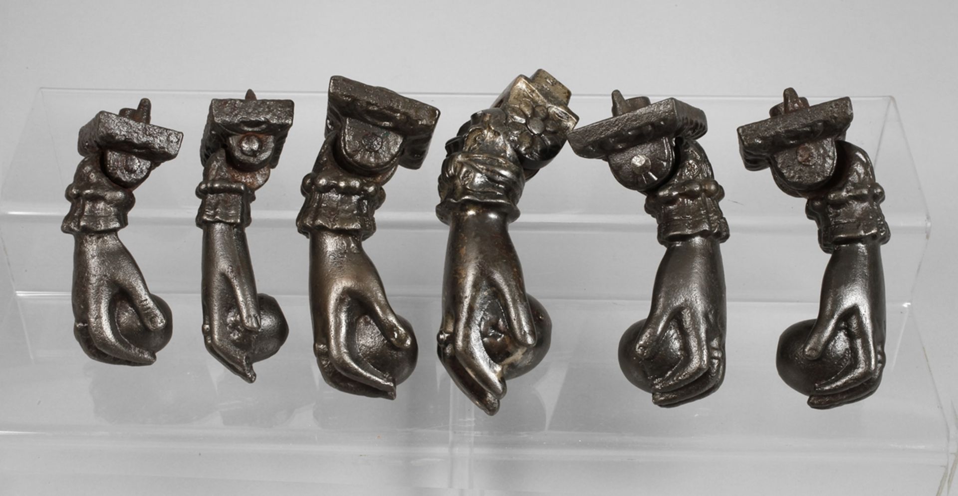 Six Biedermeier door knockers