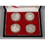 Vier Silbermünzen China