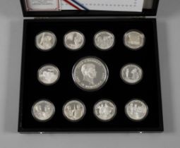 Convolute of silver medals John F. Kennedy