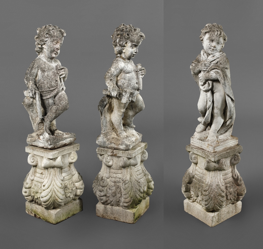 Three cast stone figures