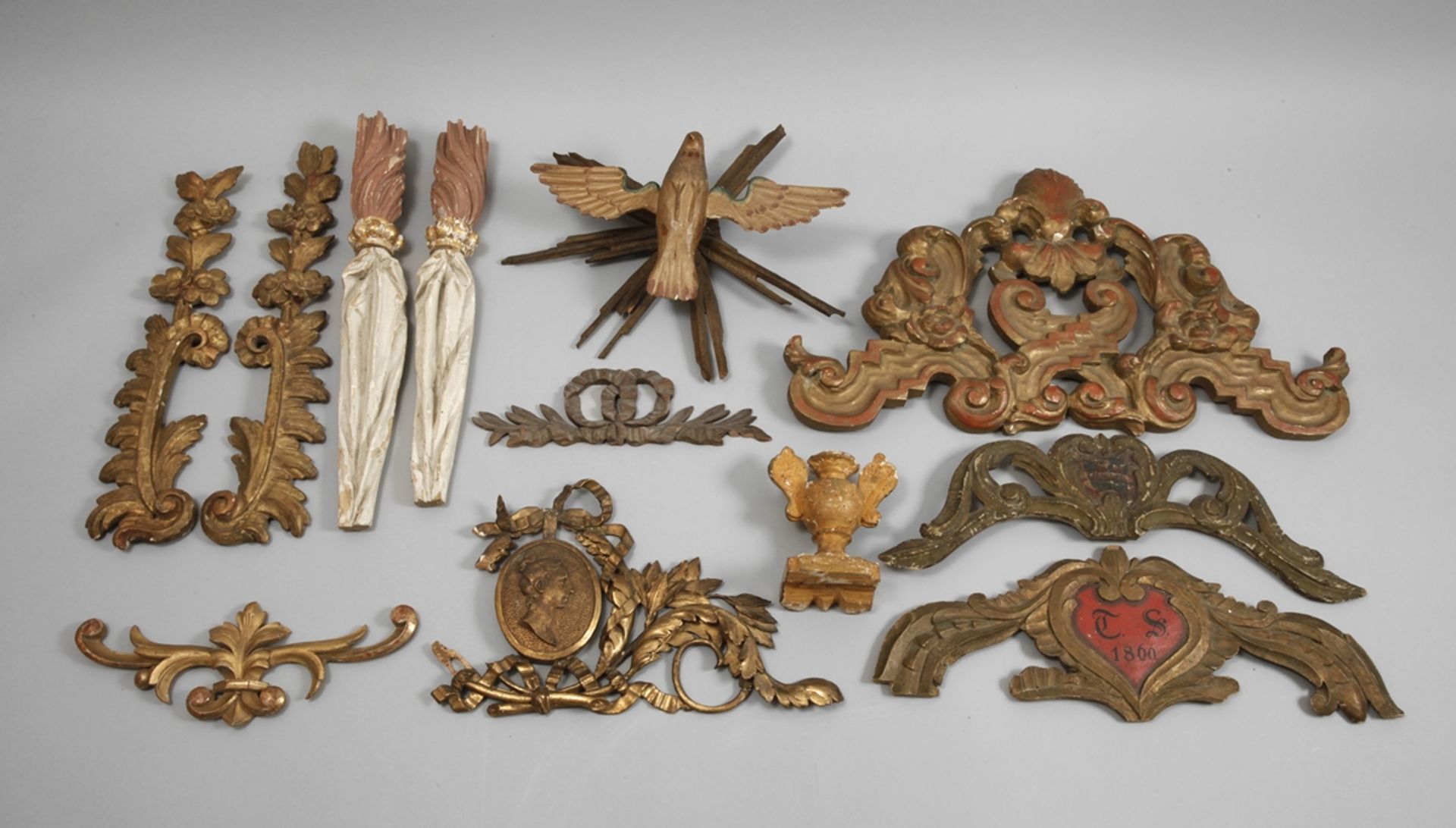 A lot of carved decorative elements