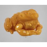 Figurative amber carving