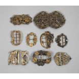 A collection of belt buckles