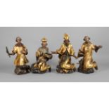 Four Baroque carved figures