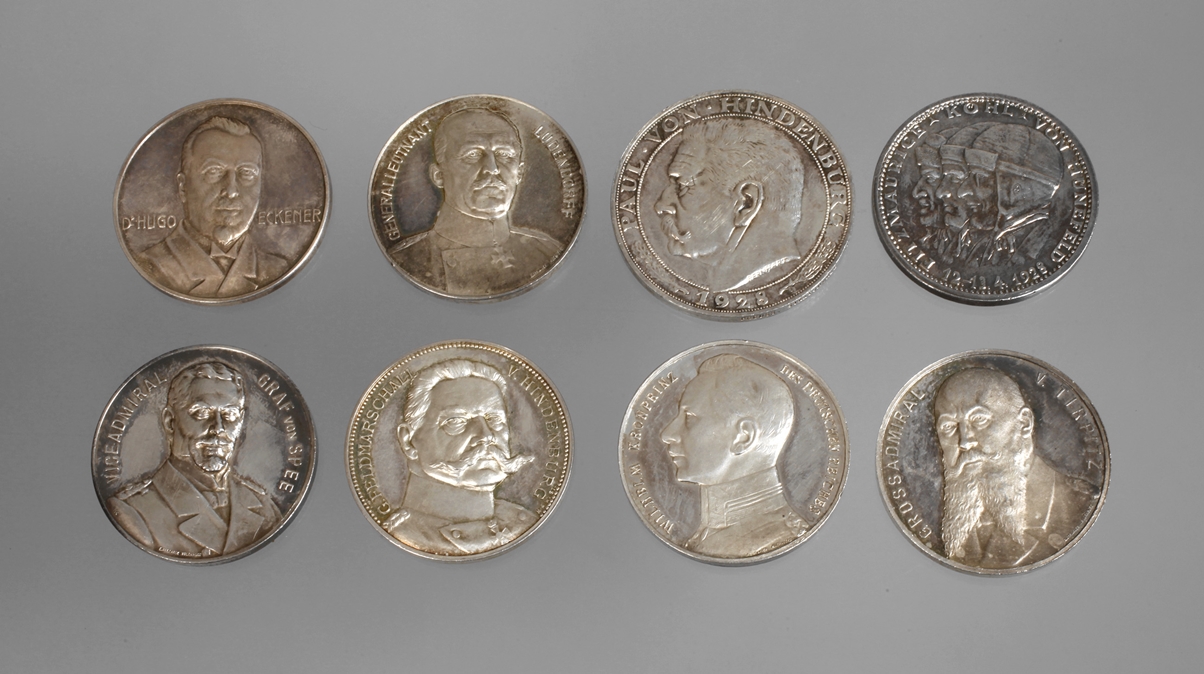A collection of patriotic silver medals