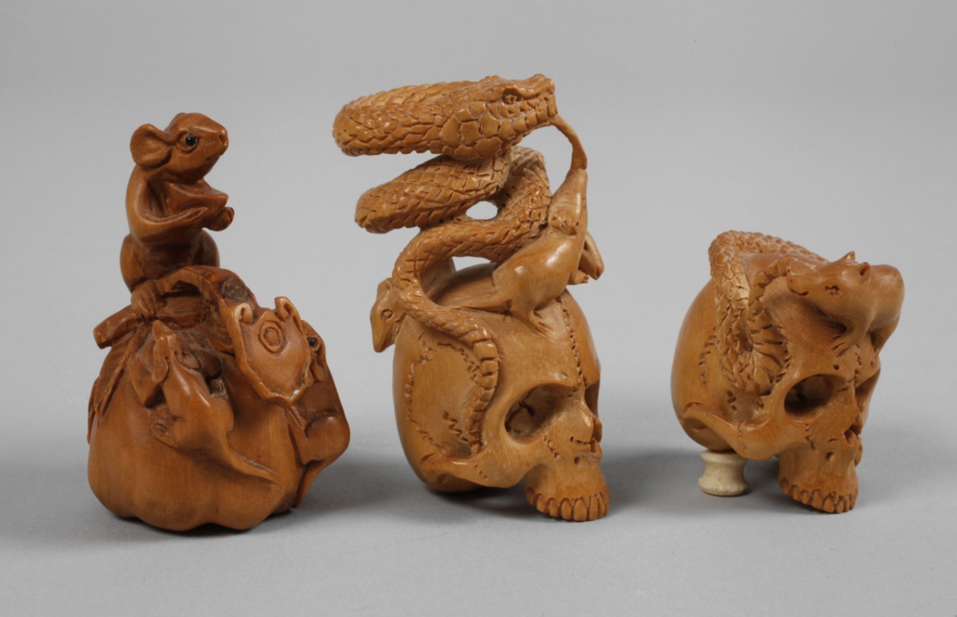 A collection of figural carvings
